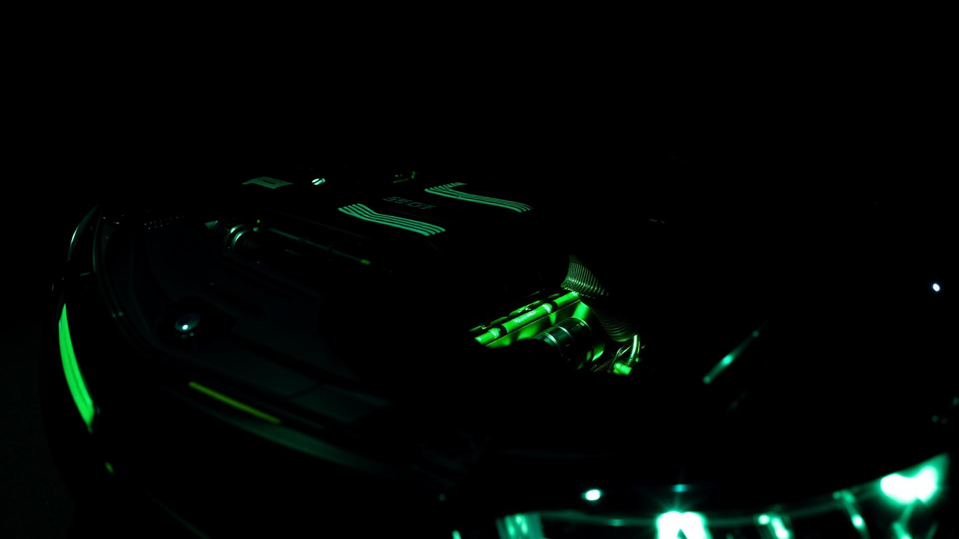 Performance engine bay with green accent lighting